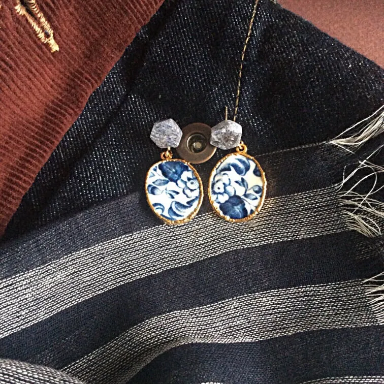 Azulejos porcelain with raw sapphire slice studs